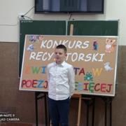 Uczestnik konkursu recytatorskiego kl. IIIb